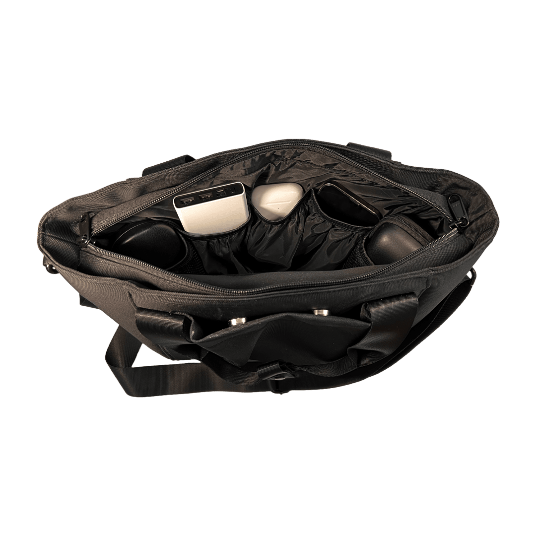 Inside of EscapeZone Stylish Women's Handbag with Faraday Pockets filled with Devices