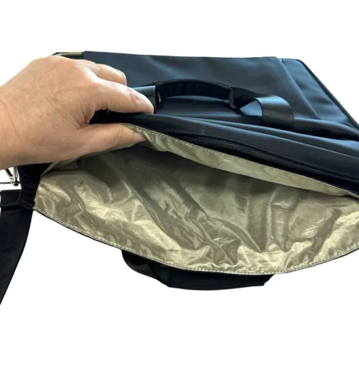 Gold-lined Faraday compartment of the laptop bag